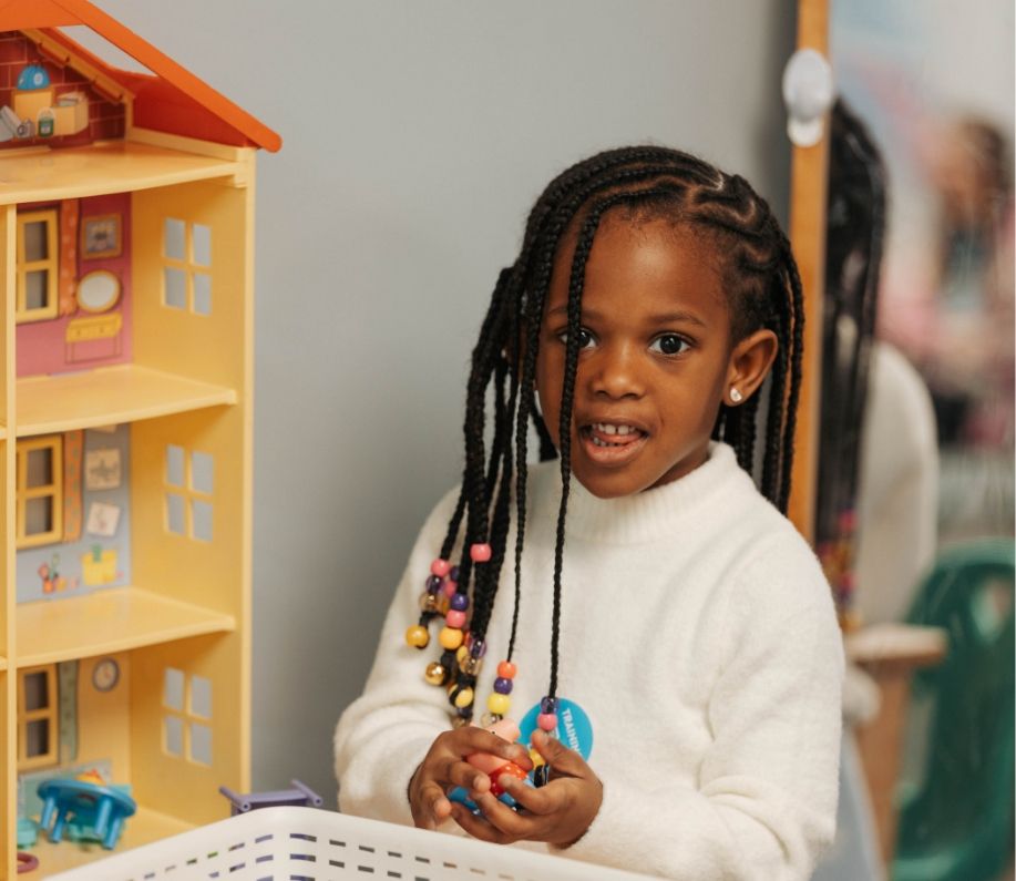 Child playing at KC Kids